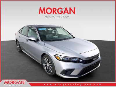 2024 Honda Civic Touring in Silver Metallic — front three-quarter view