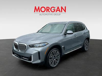 2026 BMW X5 — rear three-quarter view