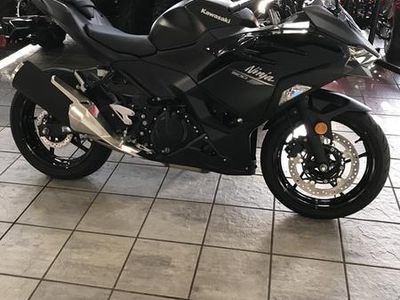 2026 Kawasaki Ninja 500 Metallic Flat Spark Black — engine compartment view