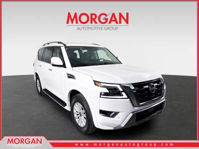 2023 Nissan Armada SV in Aspen White Pearl — front three-quarter view