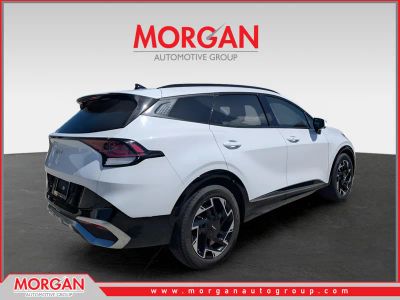 2024 Kia Sportage — rear three-quarter view