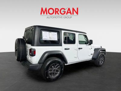 2024 Jeep Wrangler — rear three-quarter view