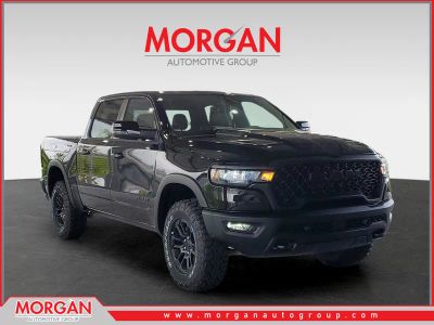 2026 Ram 1500 Rebel in Diamond Black Crystal Pearlcoat — front three-quarter view