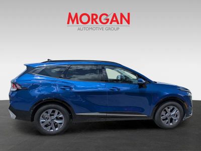 2025 Kia Sportage — rear three-quarter view