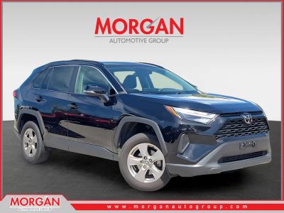2023 Toyota RAV4 XLE in Wind Chill Pearl — front three-quarter view
