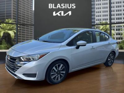 2024 Nissan Versa 1.6 SV in Brilliant Silver Metallic — front three-quarter view