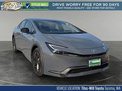 2023 Toyota Prius LE in Guardian Gray — front three-quarter view