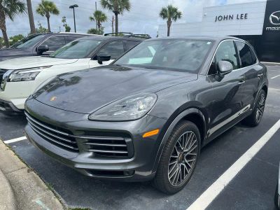2019 Porsche Cayenne Base in Quartzite Metallic — front three-quarter view