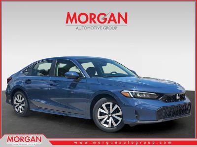 2026 Honda Civic Sedan LX in Blue Lagoon Pearl — front three-quarter view