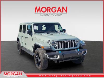 2024 Jeep Wrangler 4xe Sahara in Earl Clearcoat — front three-quarter view