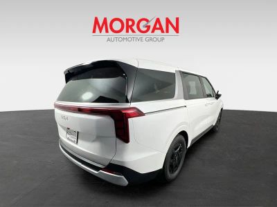 2026 Kia Carnival — rear three-quarter view