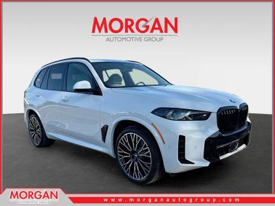2026 BMW X5 xDrive40i in Alpine White — front three-quarter view