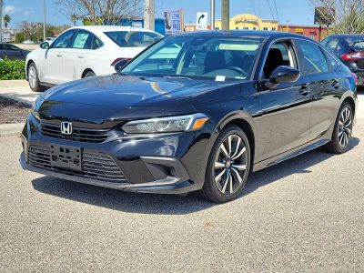 2024 Honda Civic Sedan — rear three-quarter view