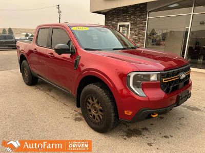 2025 Ford Maverick Tremor in Ruby Red Metallic Tinted Clearcoat — front three-quarter view