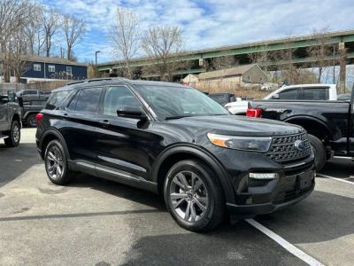 2023 Ford Explorer XLT in Black Metallic — front three-quarter view