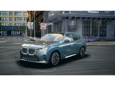 2025 BMW X3 M50 xDrive in Arctic Race Blue Metallic — front three-quarter view