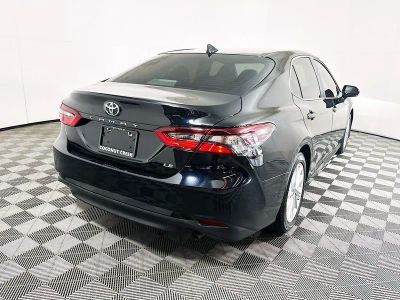 2024 Toyota Camry — rear three-quarter view