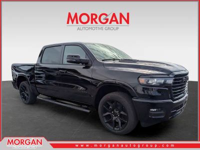2026 Ram 1500 Laramie in Black — front three-quarter view