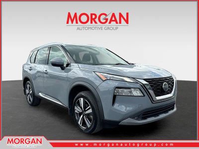 2021 Nissan Rogue SL in Boulder Gray Pearl — front three-quarter view