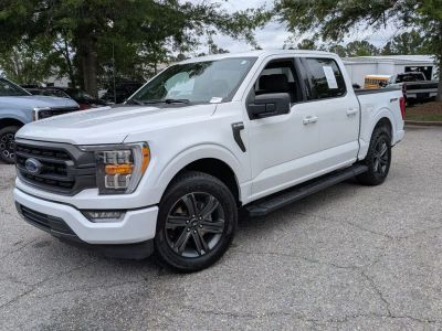 2023 Ford F-150 XLT in White — front three-quarter view