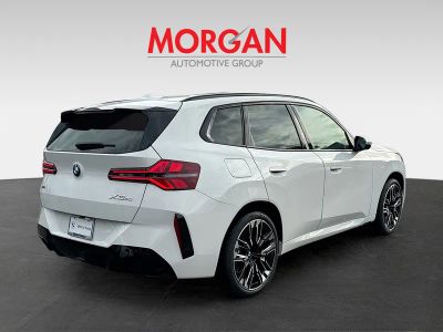2026 BMW X3 — rear three-quarter view