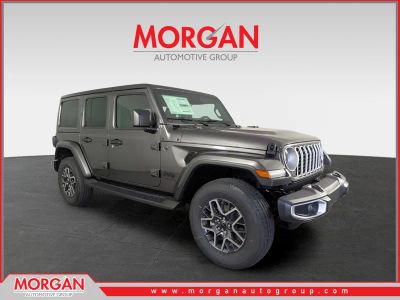 2026 Jeep Wrangler Sahara in Gray — front three-quarter view