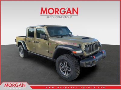 2026 Jeep Gladiator Mojave in Green — front three-quarter view