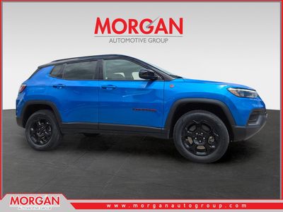 2023 Jeep Compass Trailhawk in Blue — front three-quarter view