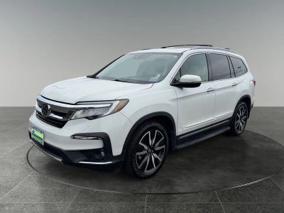 2021 Honda Pilot — rear three-quarter view