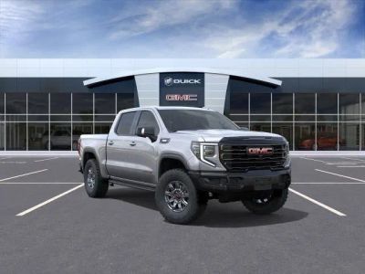 2026 GMC Sierra 1500 AT4X in Sterling Metallic — front three-quarter view