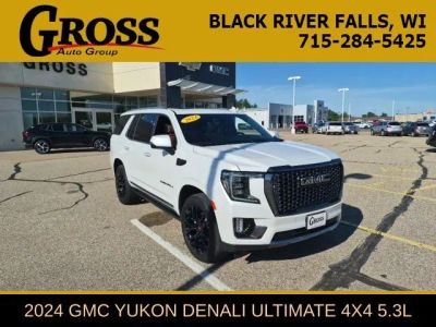 2024 GMC Yukon Denali Ultimate in White Frost Tricoat — front three-quarter view