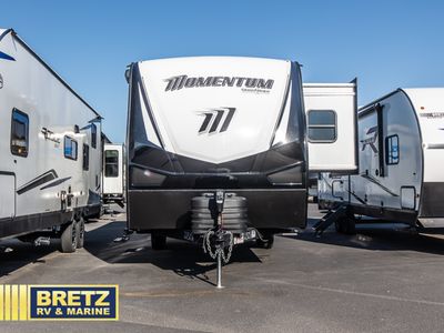 2026 Grand Design Momentum — rear three-quarter view