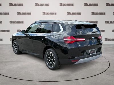 2026 BMW X3 — rear three-quarter view