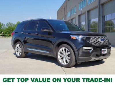 2023 Ford Explorer Platinum in Black Metallic — front three-quarter view