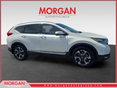 2018 Honda CR-V Touring in White — front three-quarter view