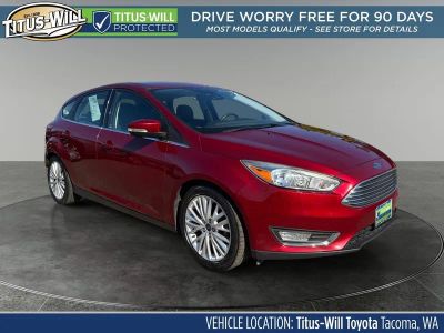 2017 Ford Focus Titanium in Ruby Red Metallic Tinted Clearcoat — front three-quarter view