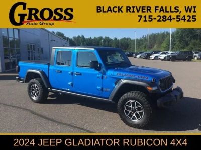 2024 Jeep Gladiator Rubicon in Hydro Blue Pearlcoat — front three-quarter view