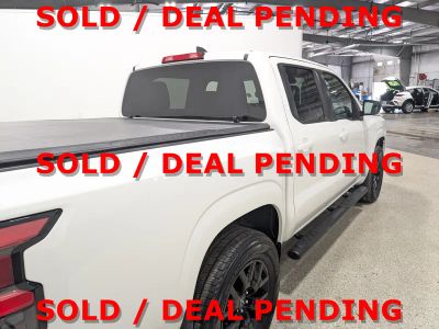 2023 Nissan Frontier — rear three-quarter view