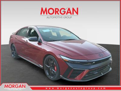 2026 Hyundai ELANTRA N Base in Ultimate Red — front three-quarter view