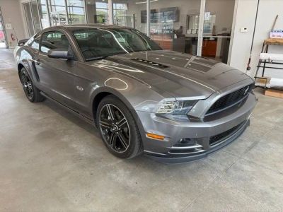 2014 Ford Mustang — rear three-quarter view