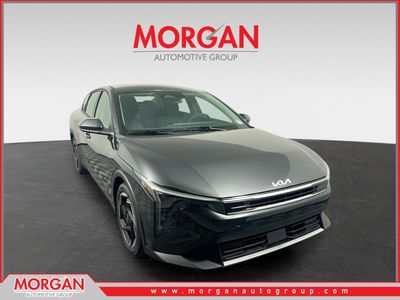 2025 Kia K4 EX in Interstellar Gray — front three-quarter view