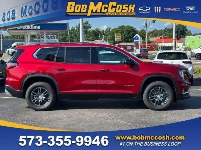 2026 GMC Acadia Elevation in Volcanic Red Tintcoat — front three-quarter view