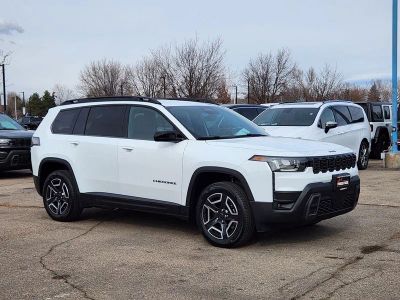 2026 Jeep Cherokee CHEROKEE LAREDO 4X4 in Bright White Clear-Coat Exterior Paint — front three-quarter view