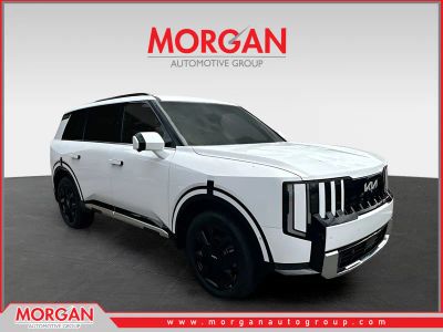 2027 Kia Telluride Hybrid SX Prestige in White — front three-quarter view
