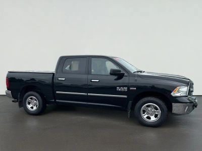 2017 RAM 1500 SLT in Black Forest Green Pearlcoat — front three-quarter view