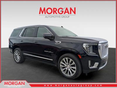 2023 GMC Yukon Denali in Blue — front three-quarter view