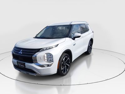 2024 Mitsubishi Outlander Plug-In Hybrid — rear three-quarter view