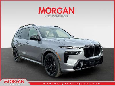 2026 BMW X7 M60i in Skyscraper Grey Metallic — front three-quarter view