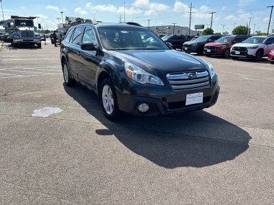 2013 Subaru Outback — rear three-quarter view