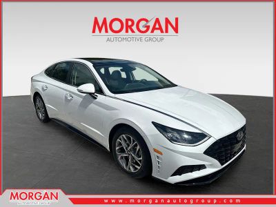 2021 Hyundai Sonata SEL in Quartz White — front three-quarter view